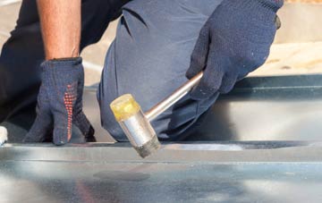 Raw metal flat roofing repairs